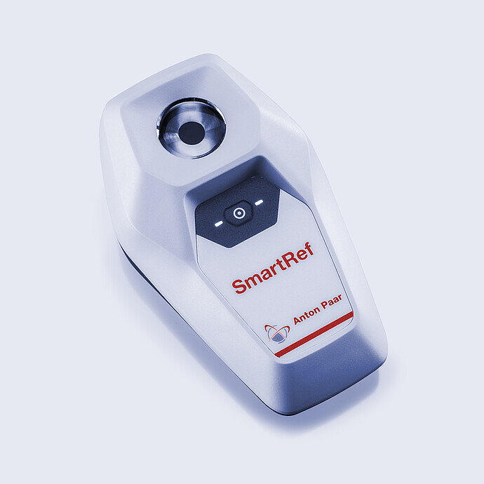 smartref refractometer with lights on  and a filled sample well